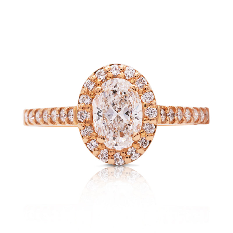 18 Carat Rose Gold Diamond Halo Ring