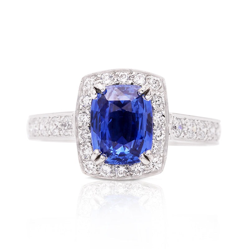 18 Carat White Gold Sapphire and Diamond Halo Ring