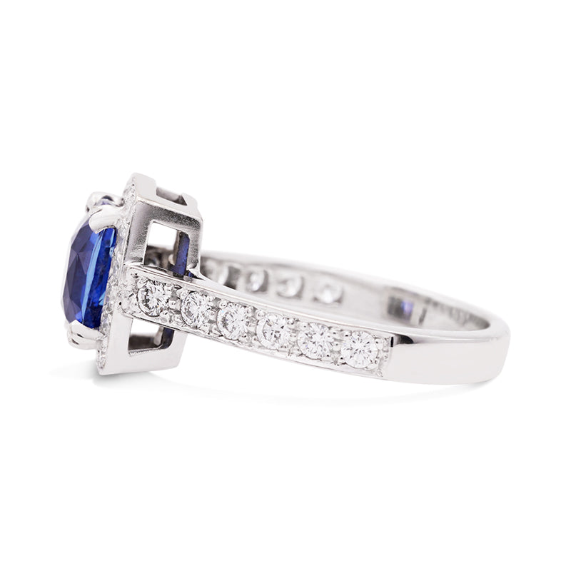 18 Carat White Gold Sapphire and Diamond Halo Ring