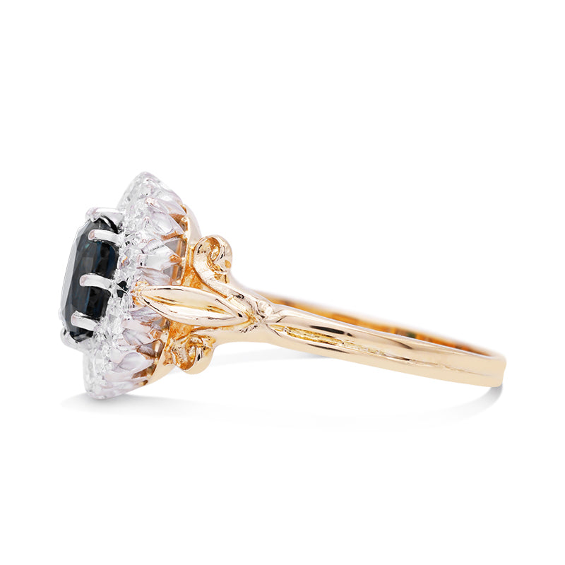 18 Carat Yellow Gold Teal Sapphire and Diamond Halo Ring