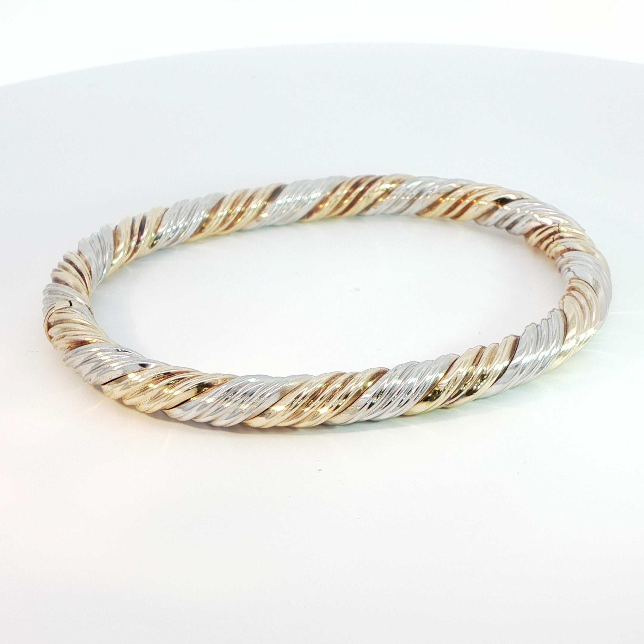 9 Carat White and Yellow Gold Twist Bangle