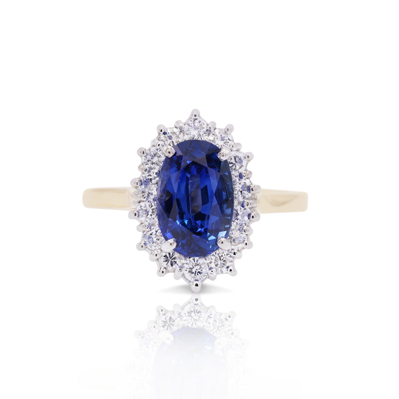 18 Carat Yellow Gold Sapphire & Diamond Halo Ring