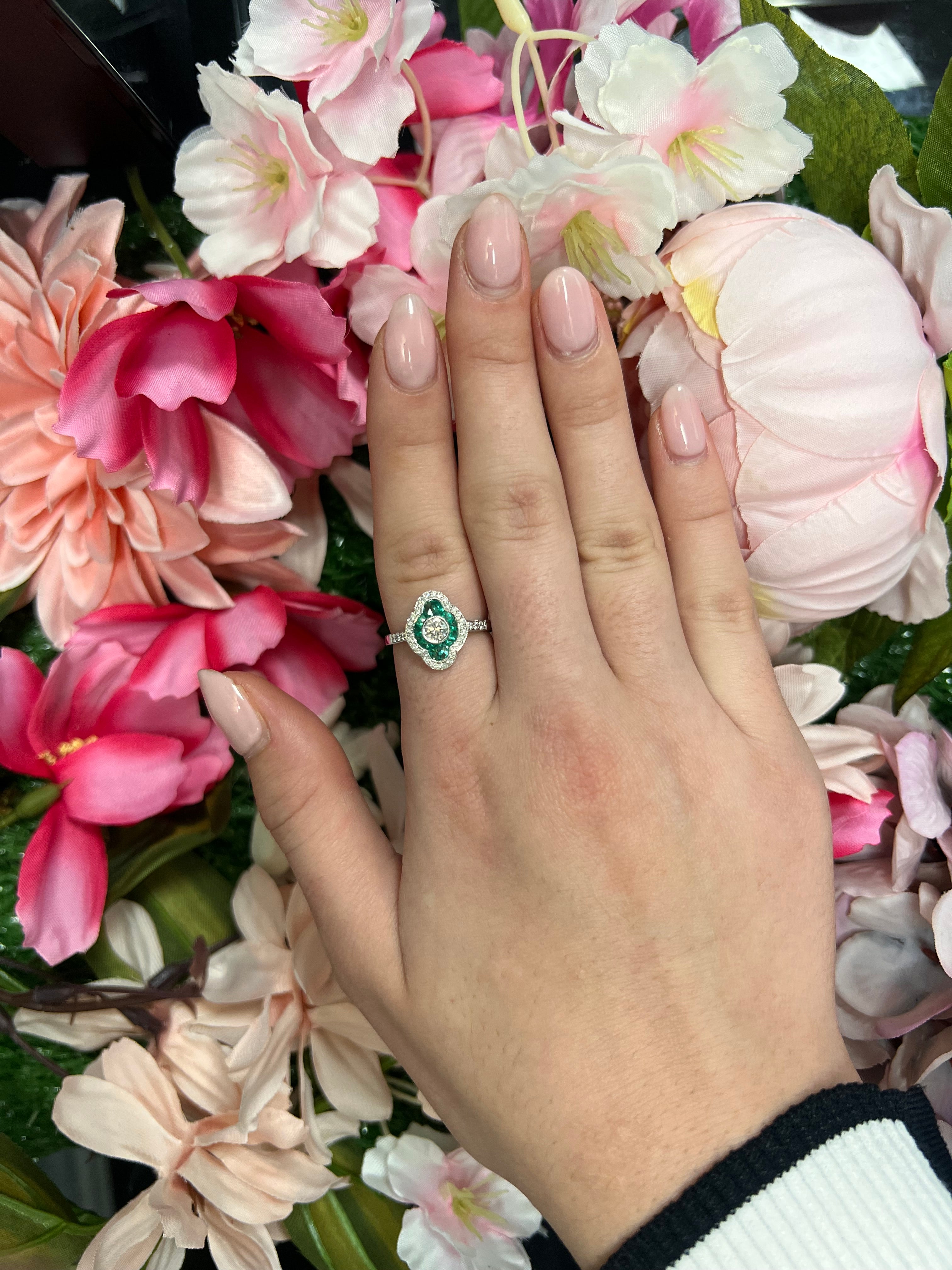 18 Carat White Gold Emerald & Diamond Dress Ring