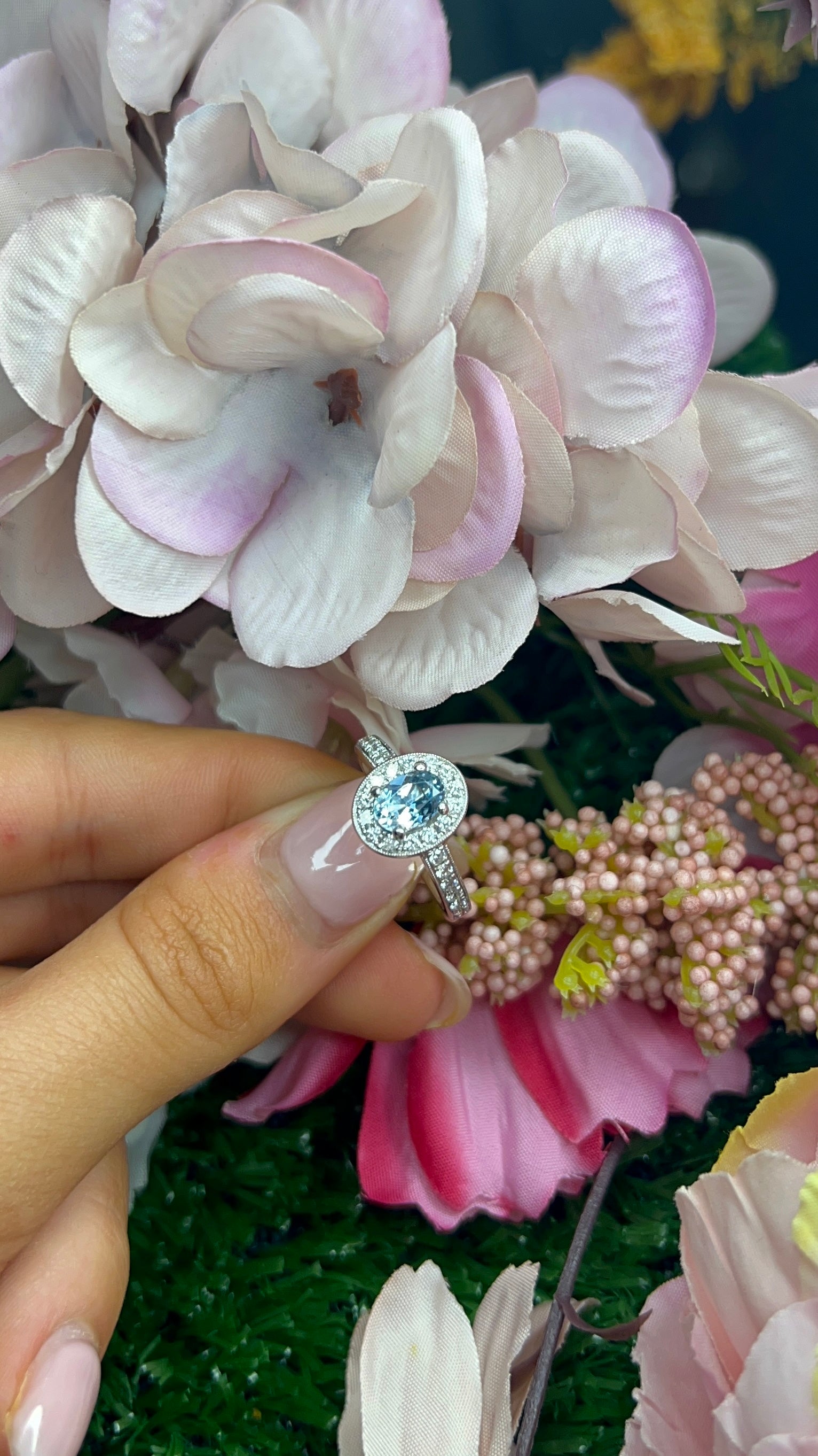 18 Carat White Gold Oval 1.00ct Aquamarine & Diamond Halo Ring