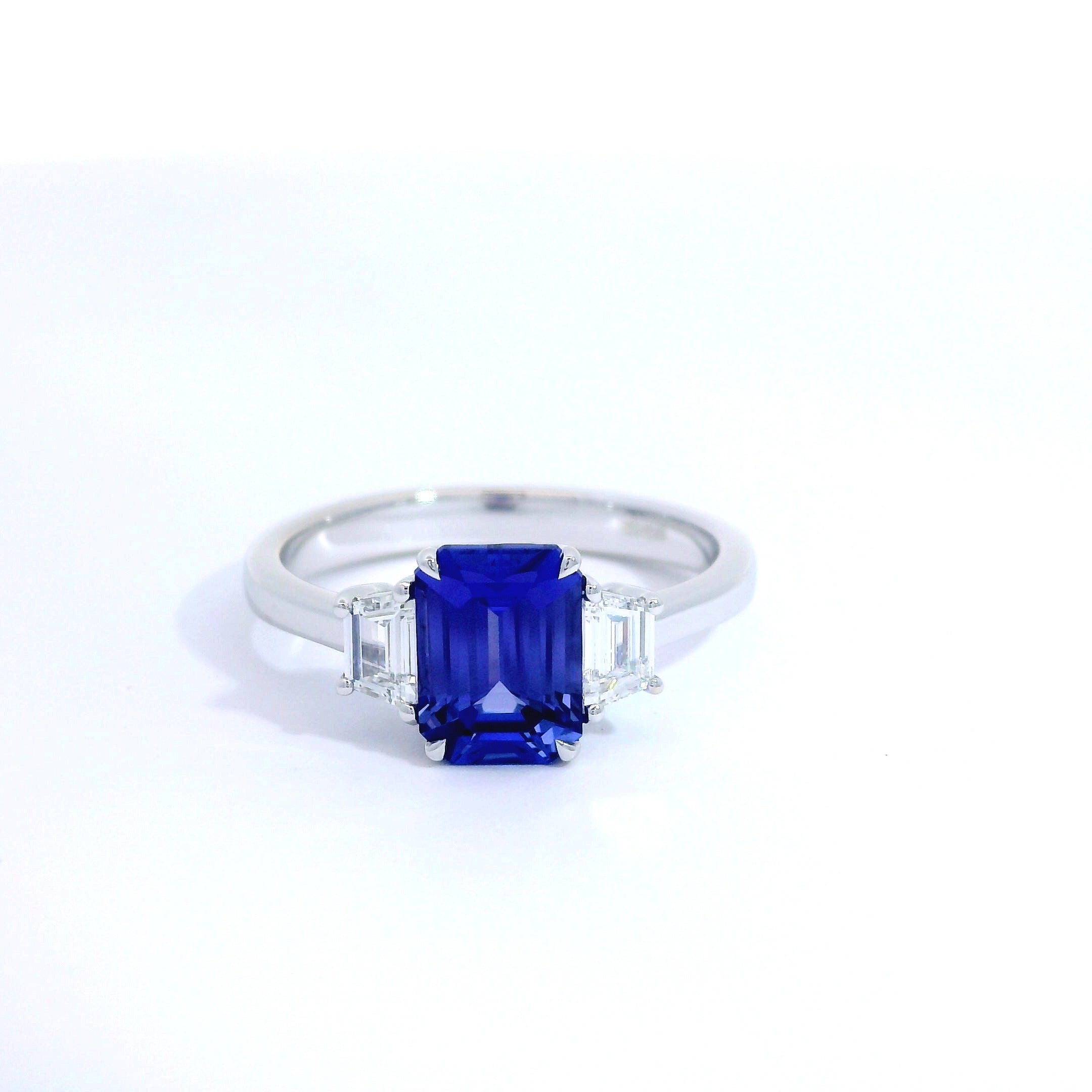 18 Carat White Gold Tanzanite and Diamond Trilogy Ring