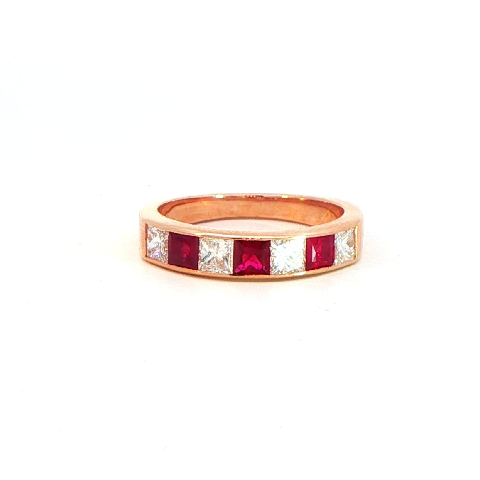 18 Carat Rose Gold Ruby and Diamond Half Eternity Ring
