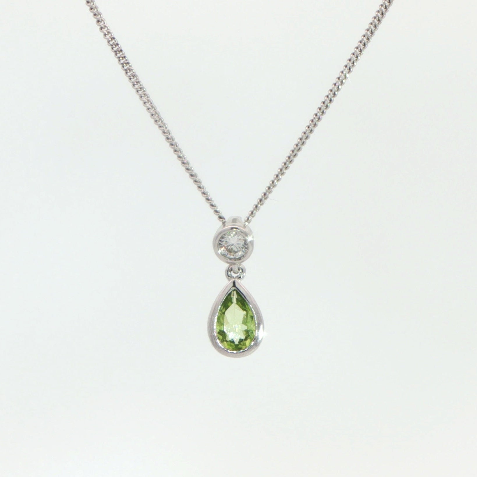 18 Carat White Gold Peridot and Diamond Pendant on Chain
